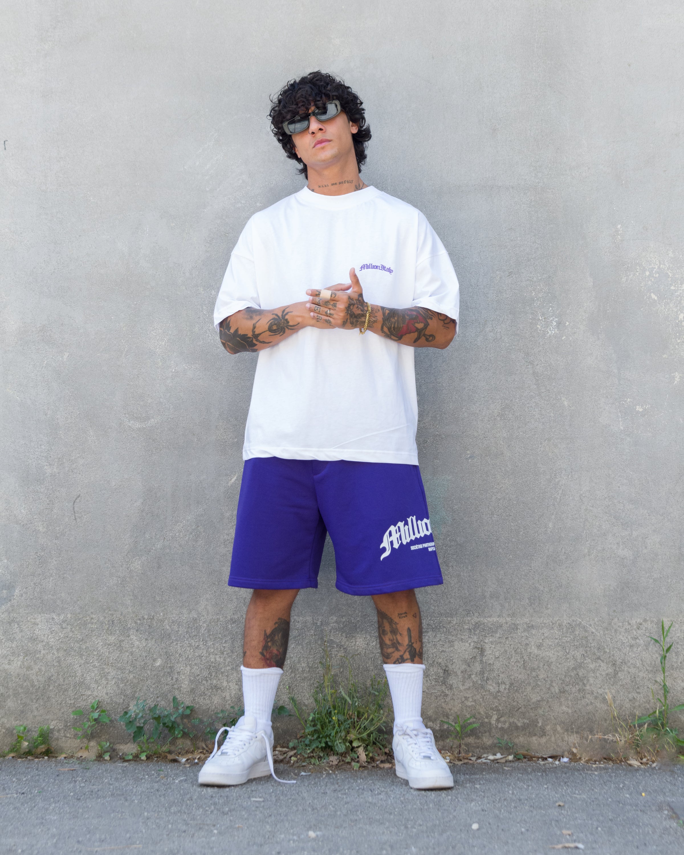 Shorts violet à logo arqué